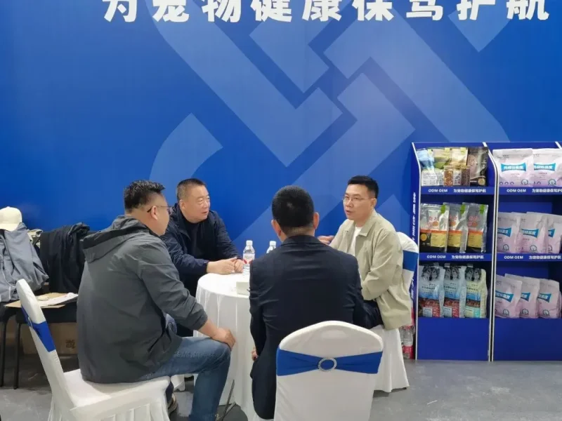 Pet nutrition exhibition display showing OEM product range